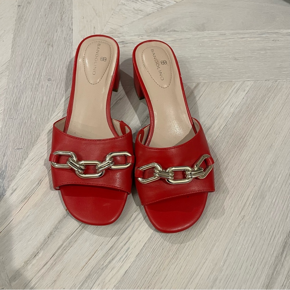 Red slides with small heel.